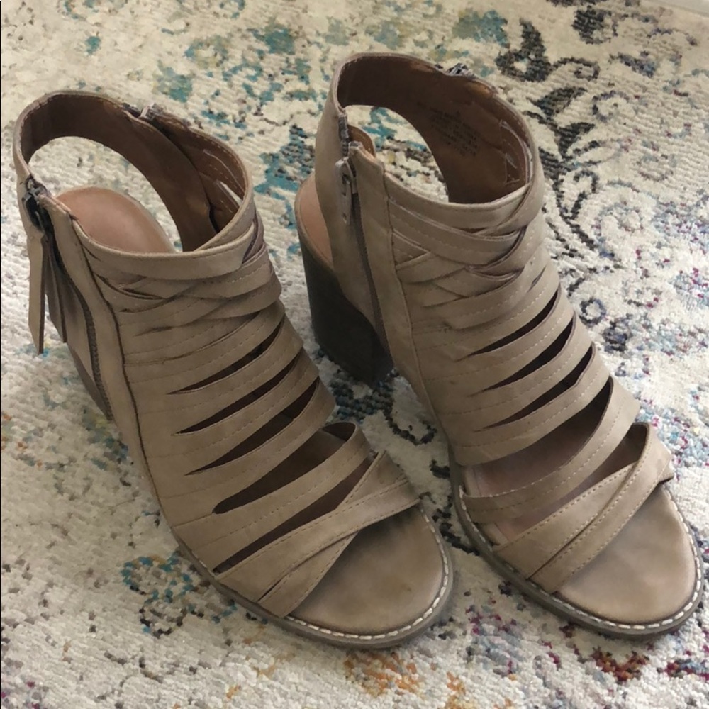 Thick heeled, strappy sandals